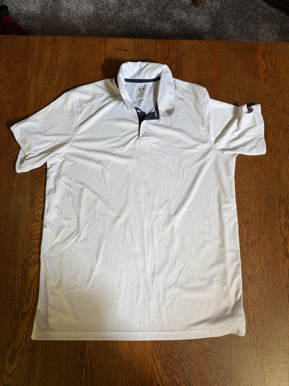 Oakley White Polo with Navy Inner Placket